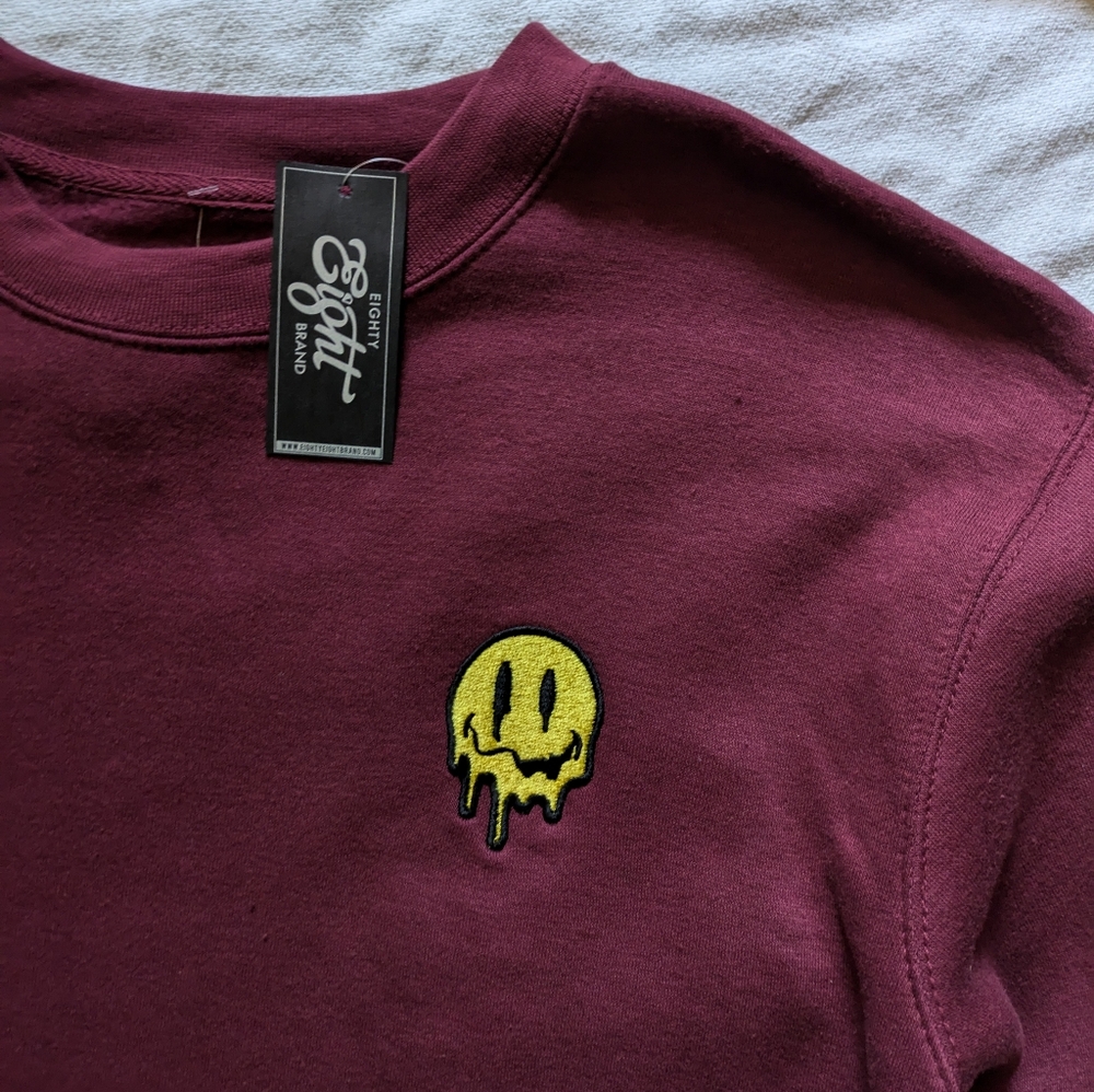 EIGHTY-EIGHT melting smiley sweatshirt